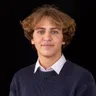 César B.
